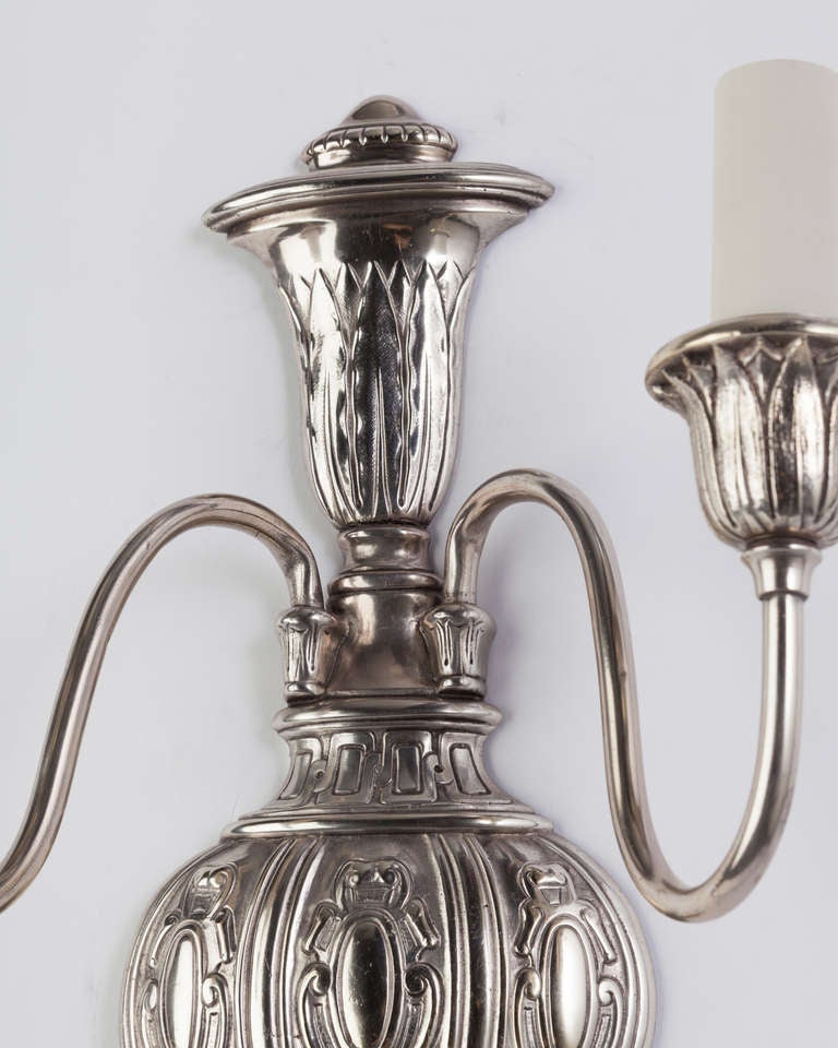 American Two Arm Silverplate over Cast Bronze Sconces with Cartouche Details, Circa 1920s For Sale