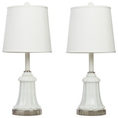 A pair of milk glass table lamps