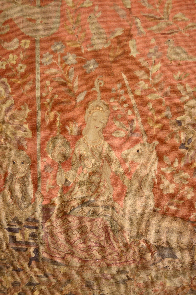 A French, 19th Century needlepoint pannel depicting a lady sitting with a unicorn and a lion, symbols of strength and virtue. Sitting in a garden.
30