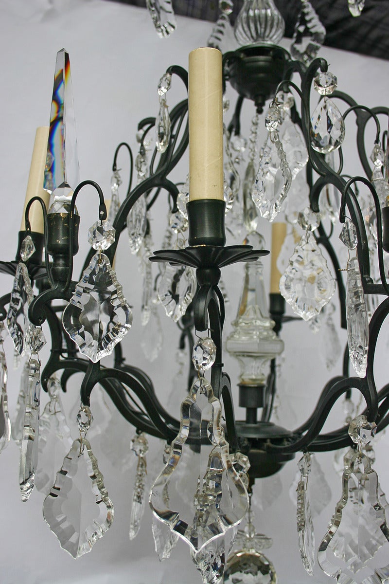 French patinated bronze and crystals chandelier with original patina, circa 1940.