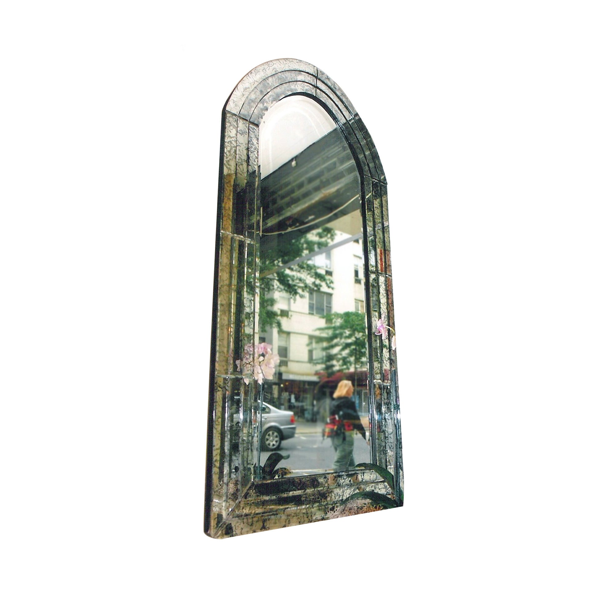 Pair of circa 1940s Italian arched top beveled mirrors, with a three layer patinated mirror frame, wooden back.
Measurements:
Wide: 27.5