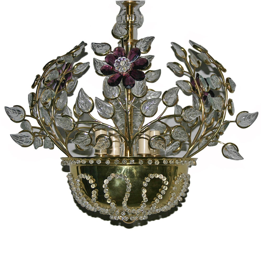 A pair of 1940’s French gilt light fixtures with 4 interior lights each. Molded glass leaves and amethyst flowers. Sold individually.

Measurements:
Diameter: 18″
Minimum drop: 20″