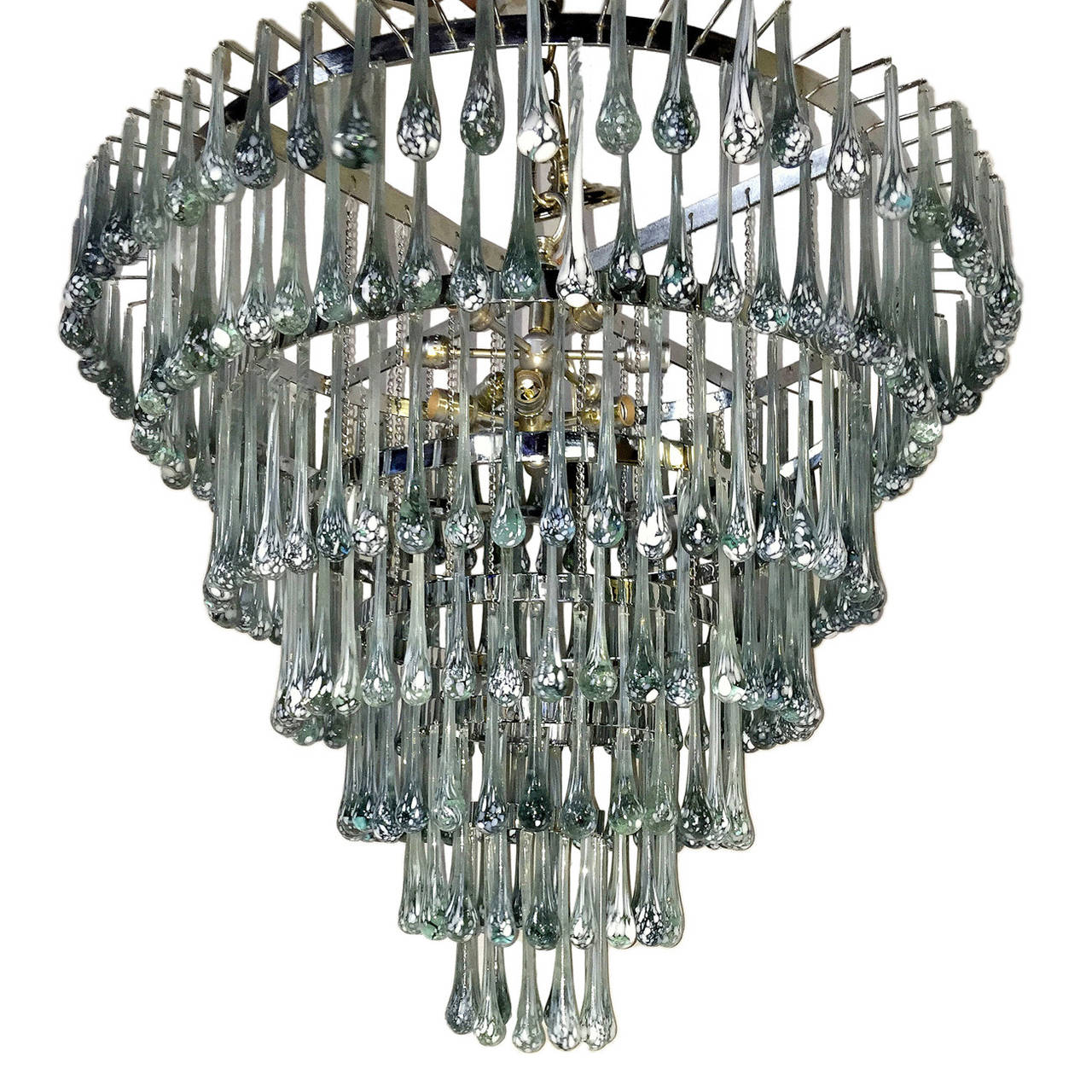 An Italian tiered light fixture with 12 interior lights, circa 1960. Nickel-plated body with aqua and white glass drops.