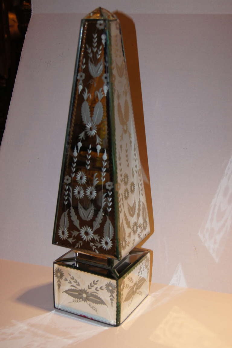 Pair of Italian etched mirror obelisks with foliage motif on four sides of body and base.
Measures: 17