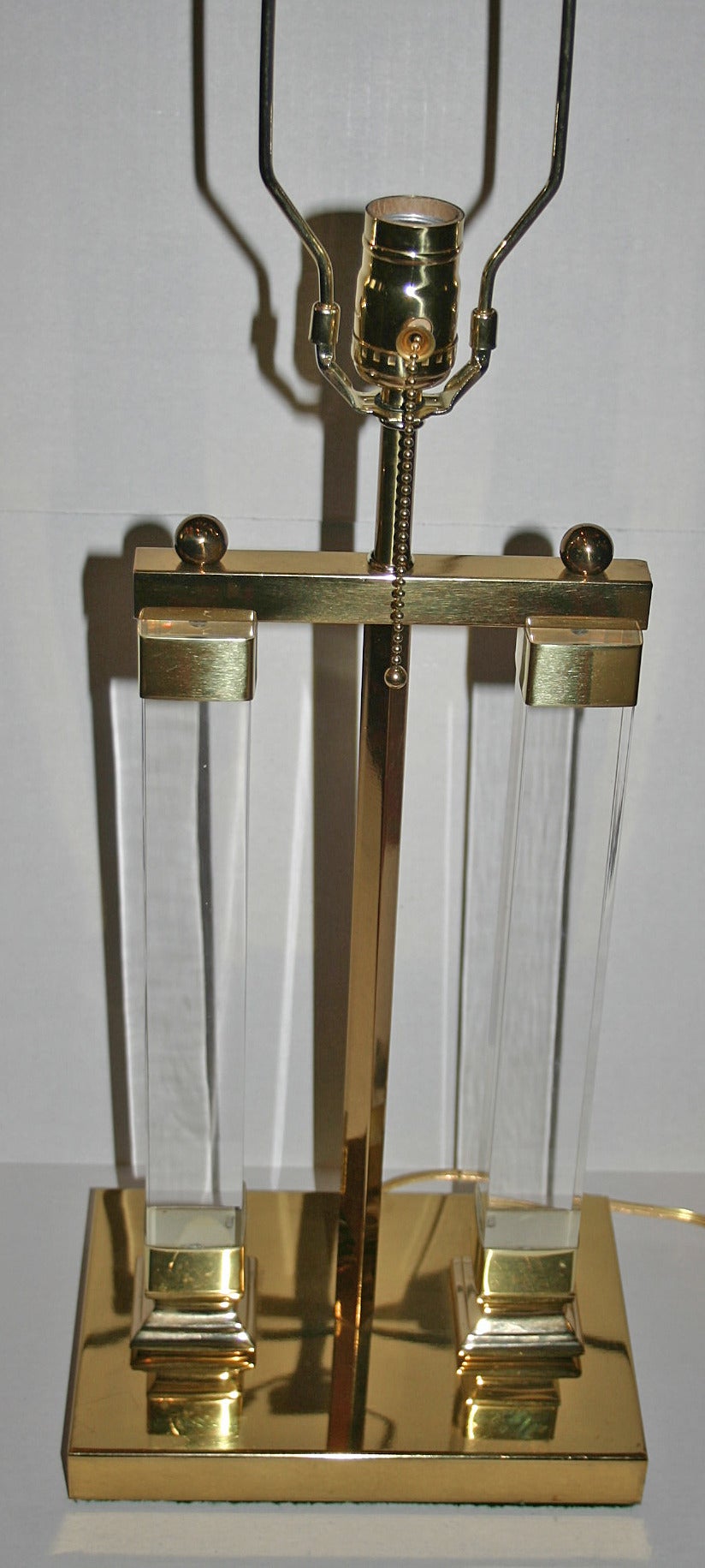 Pair of 1960s Italian gilt lamps with Lucite column body.

Measurements:
Height of body:17 3/4