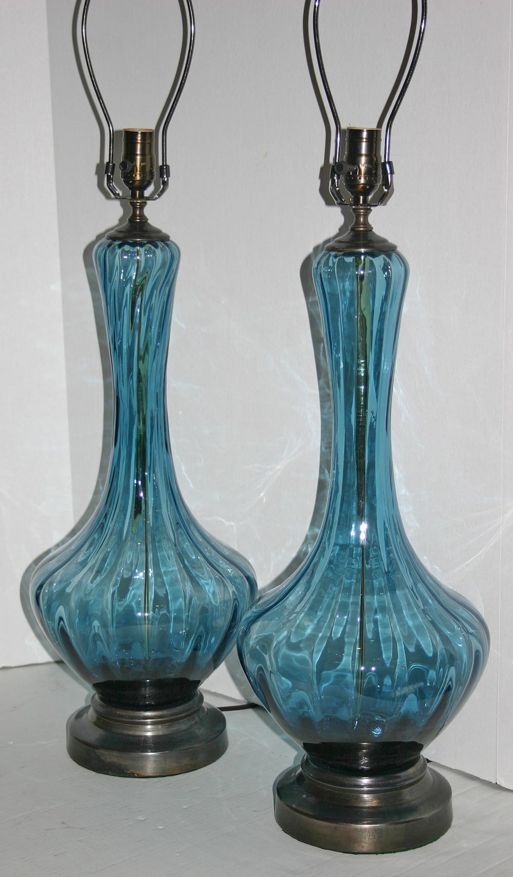 Pair of 1940s Venetian glass blue table lamps with patinated metal bases.