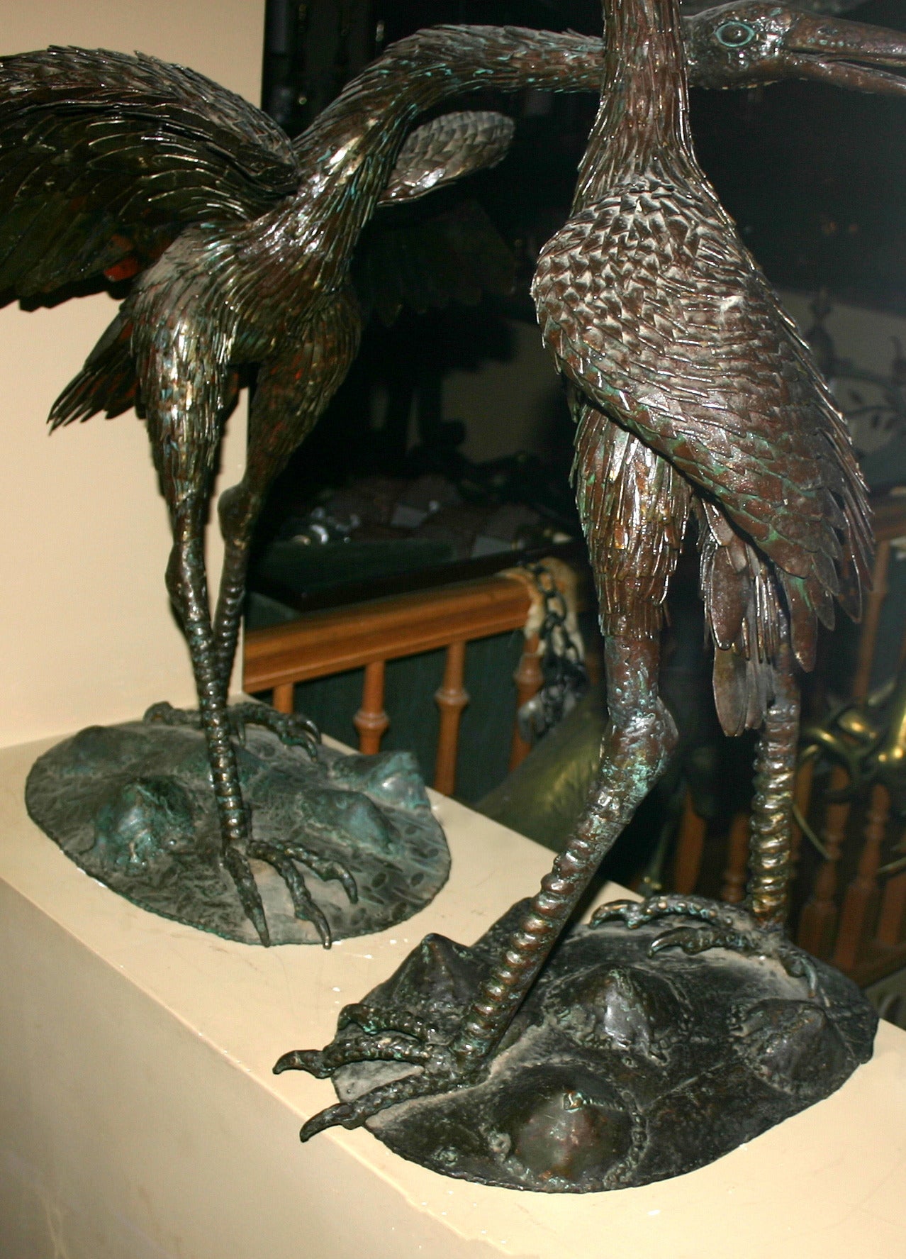 Hammered Pair of Large Iron Cranes Sculptures For Sale