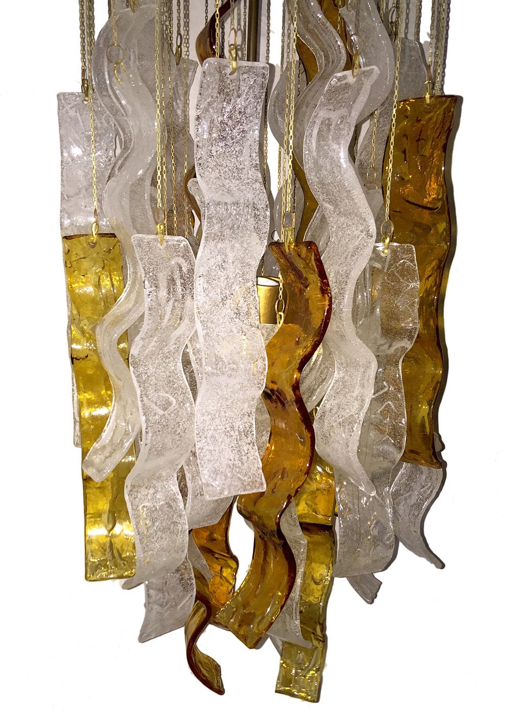 A circa 1960 Italian moderne style glass light fixture with clear and amber glass.

Measurements:
16