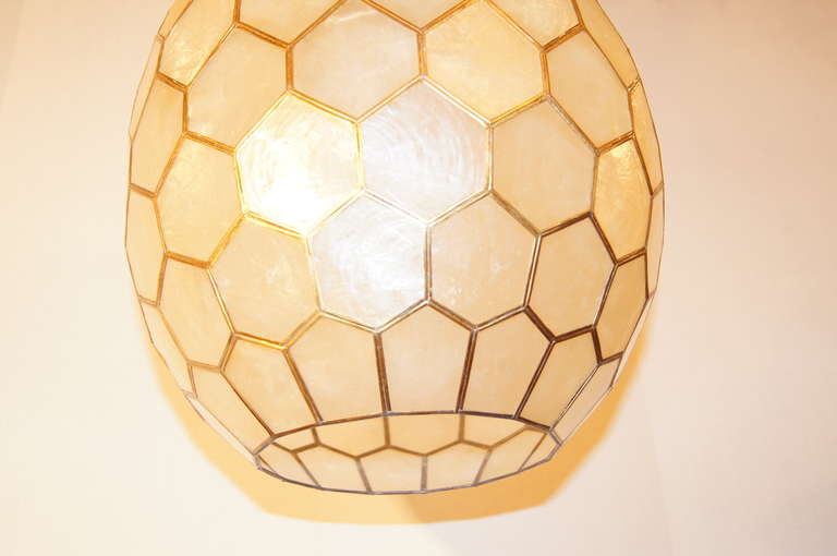 A circa 1960 capiz shell lantern with gilt frame and original patina.

15.5