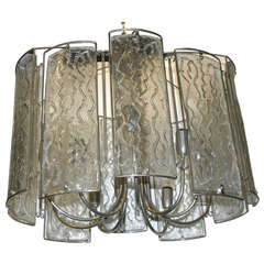 Moderne Oval Light Fixture with Glass Insets