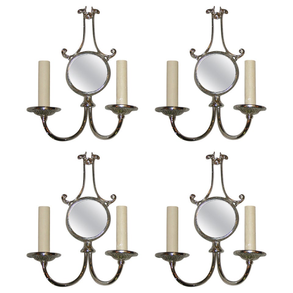 Set of Four Silver Sconces with Black Mirror Insets. Sold for pair For Sale