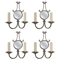 Set of Four Silver Sconces with Black Mirror Insets. Sold for pair