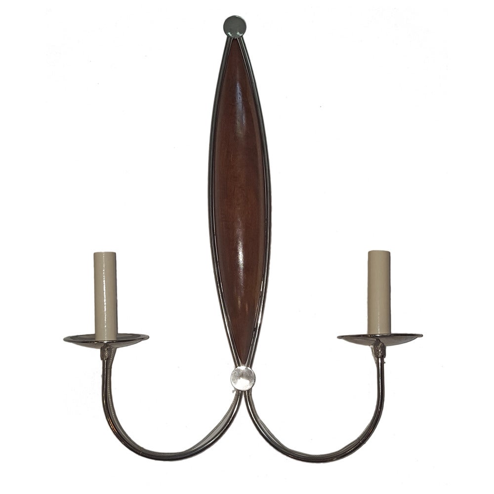 Pair of circa 1960s Italian moderne style nickel plated sconces with wood backplate.
Measurements:
Height: 21.25