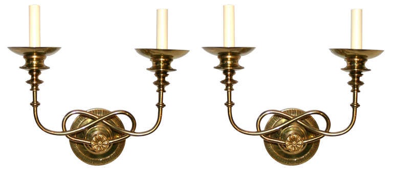 Set of 1940s French moderne style double light sconces with round backplates. Sold in pairs.

Measurements:
13