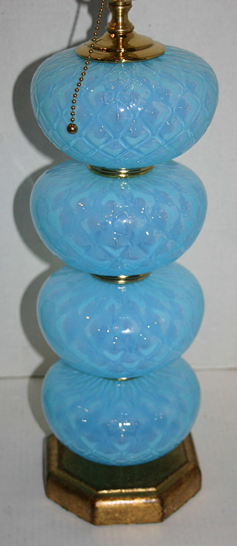 Pair of circa 1940's Murano glass table lamps with gilt bases.

Measurements:
Height of body: 17