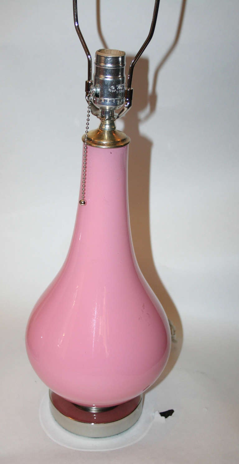 Pair of circa 1950's French pink opaline table lamps with silver tone bases.

Measurements:
Height of Body: 16.25