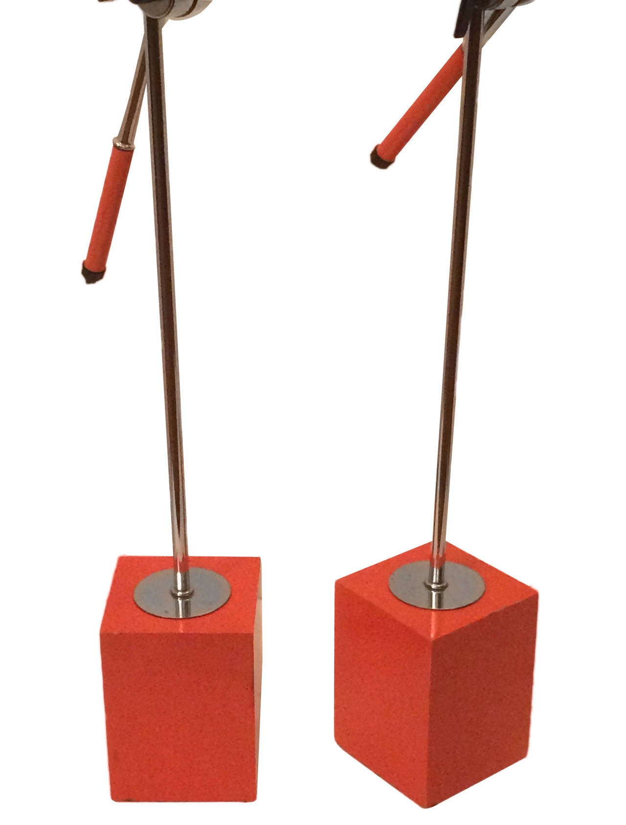 Pair of circa 1960's Italian moderne style lamps, painted orange and nickel plated.

Measurements:
Height: 31