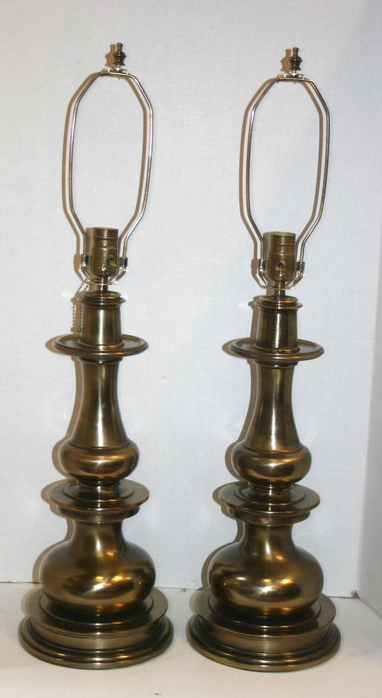 Pair of 1940s American patinated bronze table lamps with original patina.