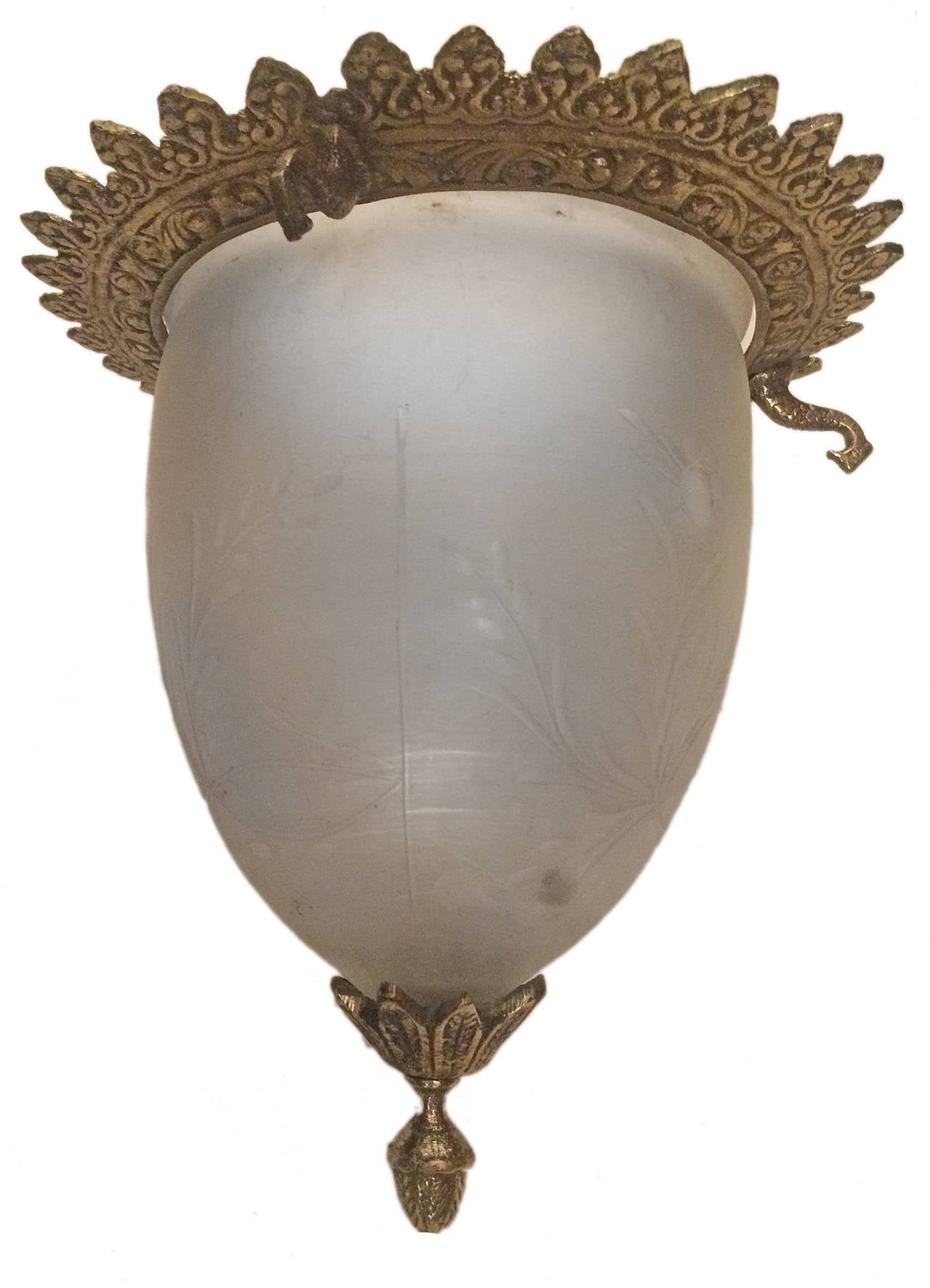 An Italian etched glass lantern with brass fittings, circa 1930. Foliage details on body. Mounted with three chains. 

Measurements:
10