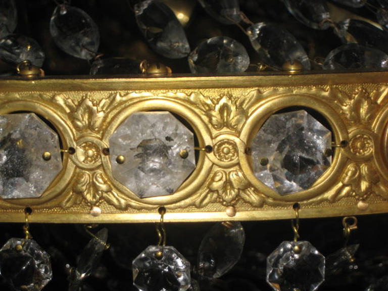 20ième siècle Lustre ovale en bronze doré et cristal de roche en vente