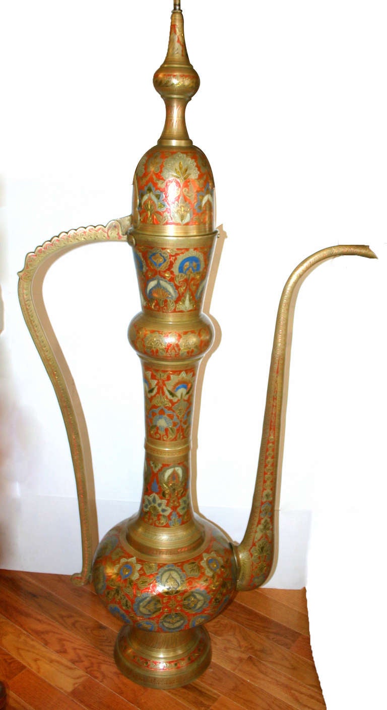 A single large circa 1940s Turkish etched and polychromed brass ewer floor lamp.

Measurements:
Height of body 62