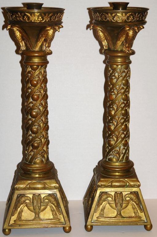 Pair of 19th century Italian bronze candlesticks with eagles and pomegranates depicted on body. 

Measurements:
Height 24