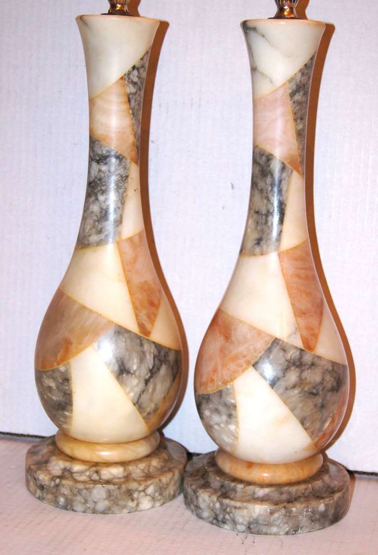 Pair of circa 1940s Italian mosaic alabaster table lamps with veined alabaster bases.

Measurements:
Height of body 17