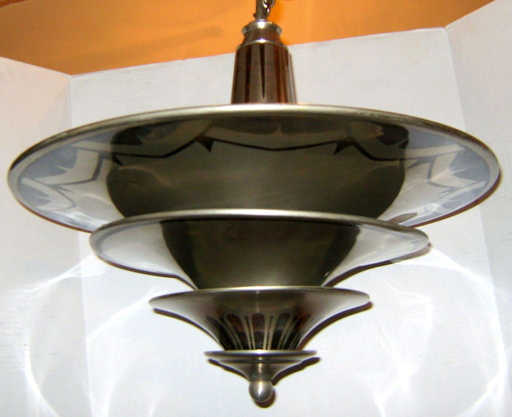 A, circa 1930s French Art Deco light fixture with enameled decoration on body.

Measurements:
Height: 18