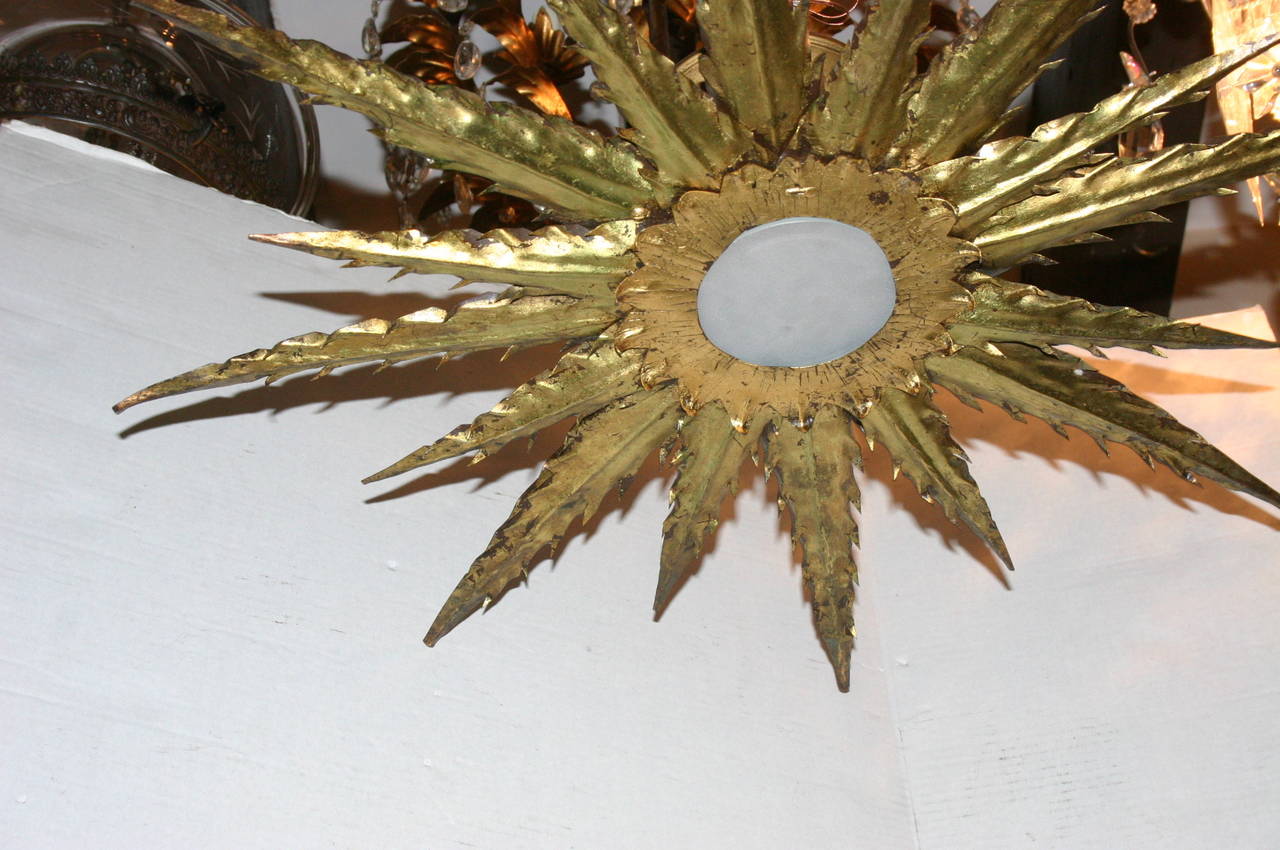 Plated Large Gilt Metal Sunburst Light Fixture For Sale