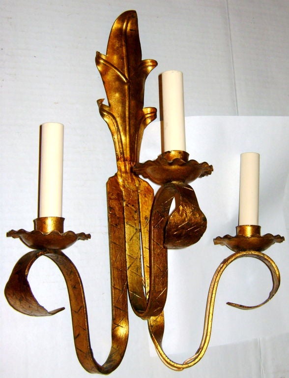 Pair of 1930's French 3 arm sconces with original finish and patina.

Measurements:
Height: 16.5