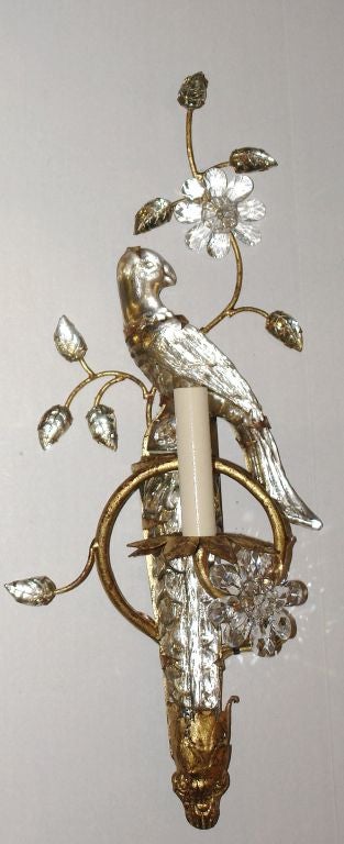 Pair of 1930s French gilt metal sconces with molded glass birds. Sold per pair.

Measurements:
Height 21?
Width 6?
Depth 4?.
