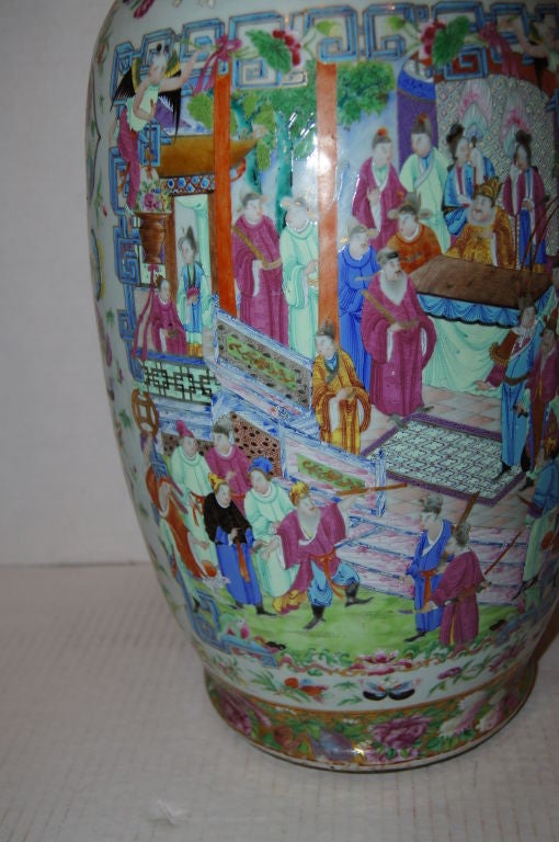 Large Chinese vase with various court scenes.
Measures: 24