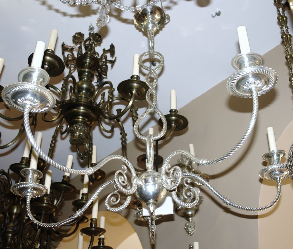A circa 1930's French silver-plated chandelier with twisted rope design.

Measurements:
Height: 40