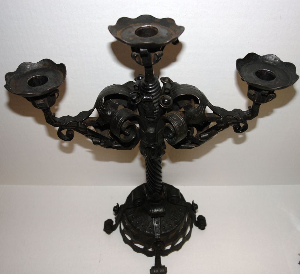 Late 19th Century American wrought iron arts and crafts candelabra.

Measurements:
Height: 18
