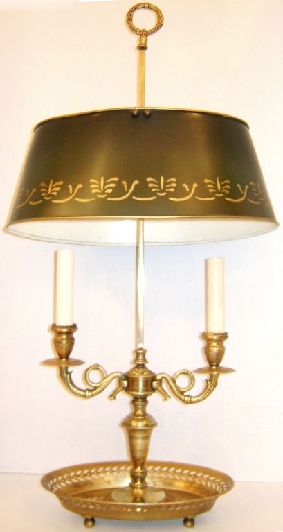 A circa 1940’s French bouillotte lamp.

Measurements:
Height: 28″
Diameter (of Shade): 14″