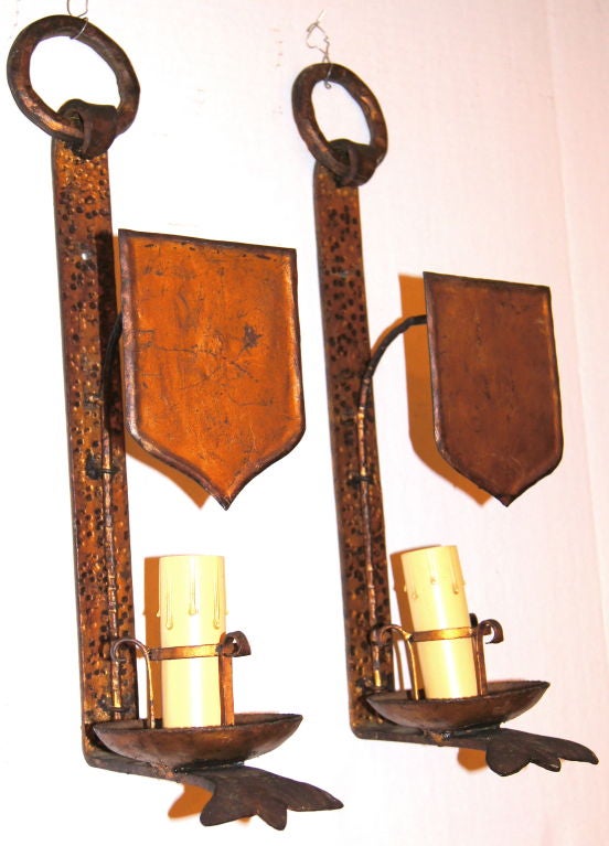 Pair of gilt metal Italian sconces with shield shades. Single light.
Measures: 19