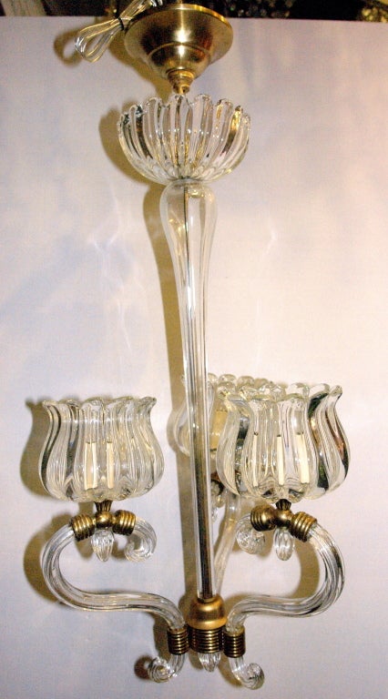 A circa 1930's Murano three-arm glass chandelier.

Measurements:
Drop: 30