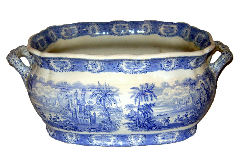 Late 19th century English porcelain cachepot with landscape decoration.

Measurements:
Height 8.5