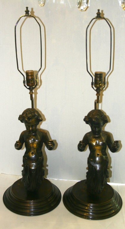 Bronze Pair of Lamps Shaped as Putti For Sale