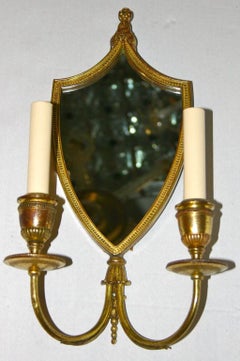 Coppia di appliques in bronzo dorato
