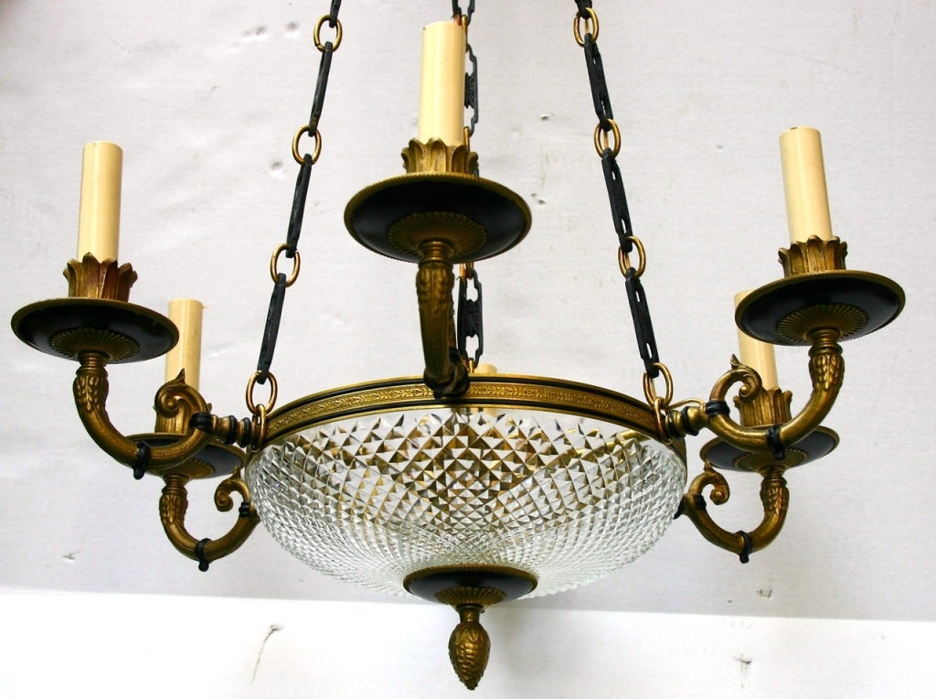 Circa 1920 French molded glass empire style light fixture with painted and gilt finish. Body with crystal inset.
Available at our 238 East 60th street showroom Telf:212-751-0171
