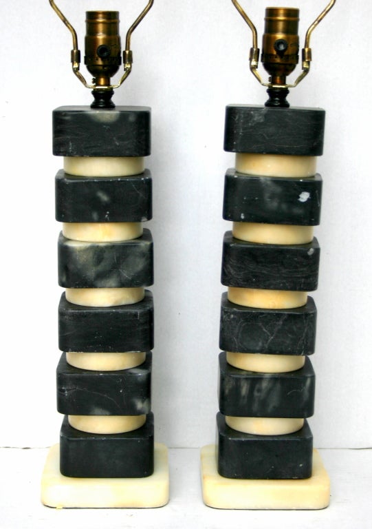 Pair of Italian late 1940s black and white table lamps with original patina.

Measurements:
Height of body 14.5