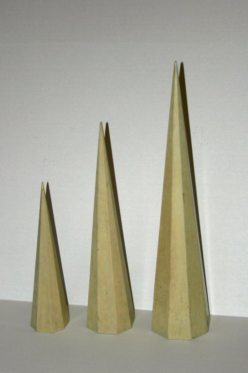Set of three Italian, circa 1960s carved wood cones with original painted finish. Height 28.5