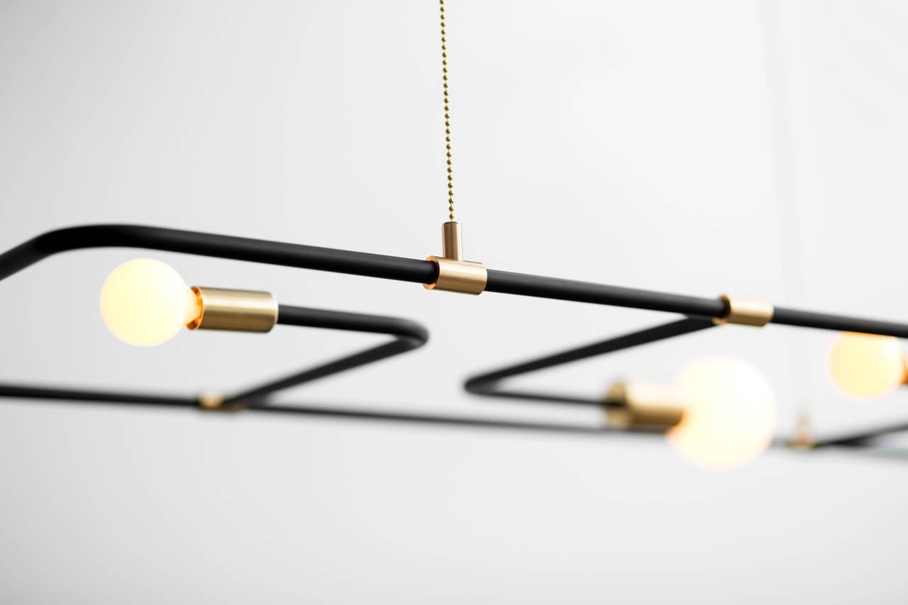 A lamp that is influenced by Mid-Century modernism, the Industrial age, and Lambert’s own Minimalist aesthetic. 

Functional as a floor lamp, pendant, or wall lamp.