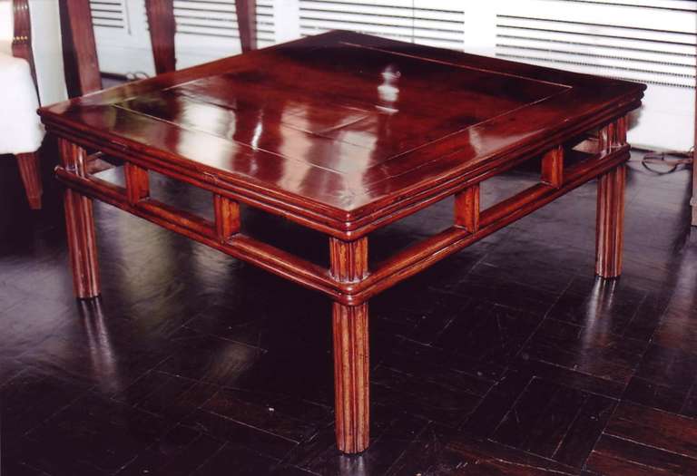 19th century Chinese walnut cocktail table, reeded apron and round reeded legs to simulate bamboo.