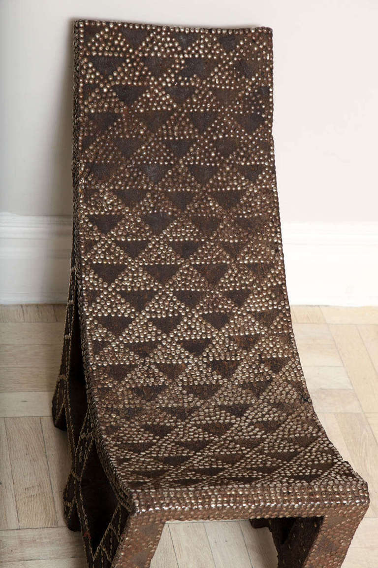 Late-19th Century African studded chair,
Zaire