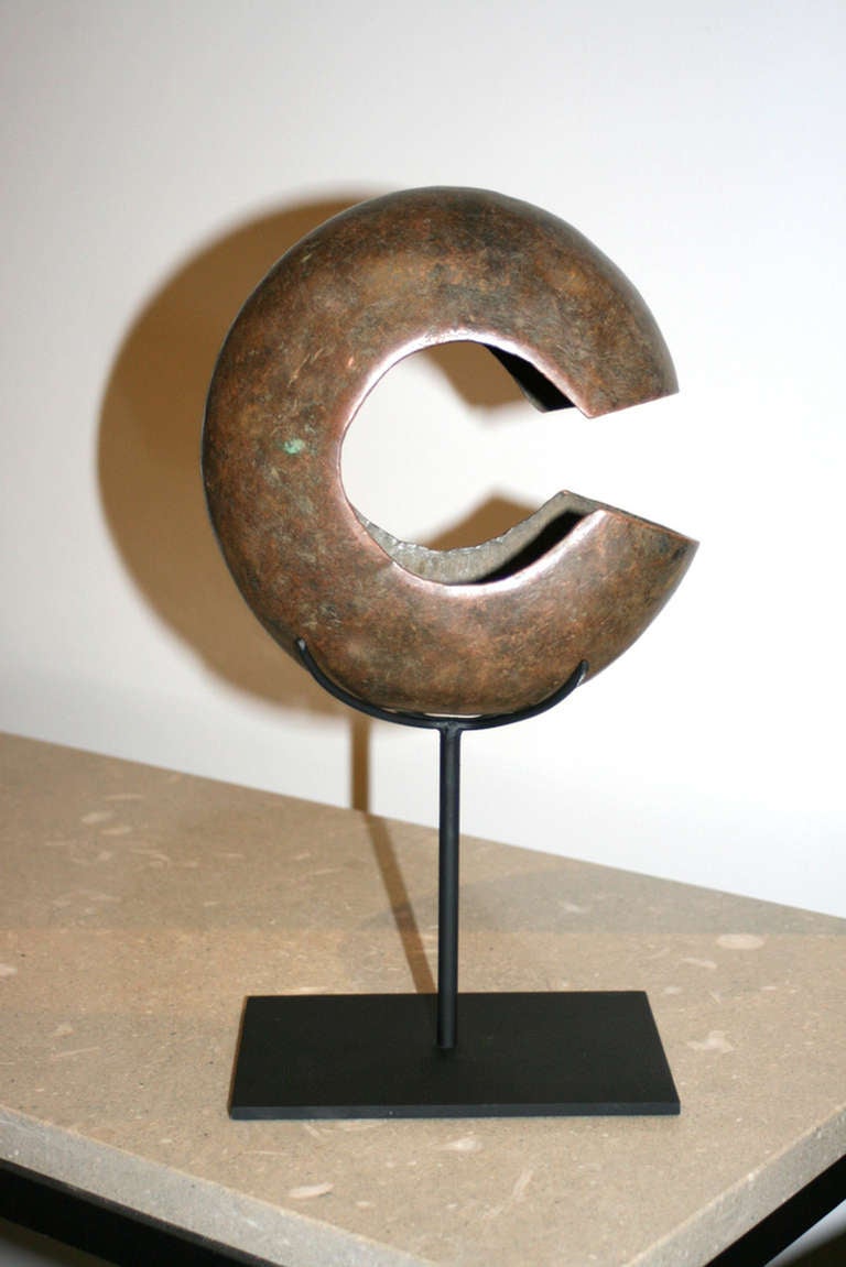 Early 20th Century copper 'Mbole' currency on contemporary blackened iron stand
'Congo'