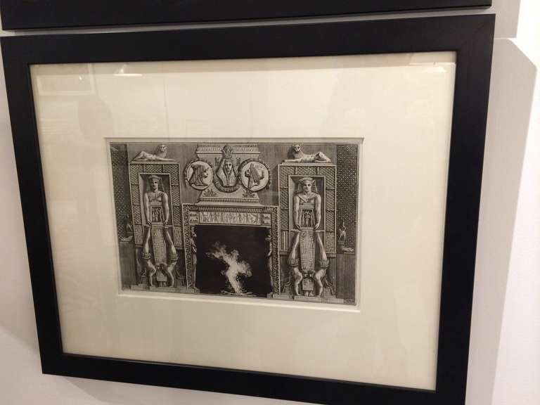 Late 19th century Piranesi engraving design for a fireplace, in the Egyptian taste depicting acrobats doing handstands.