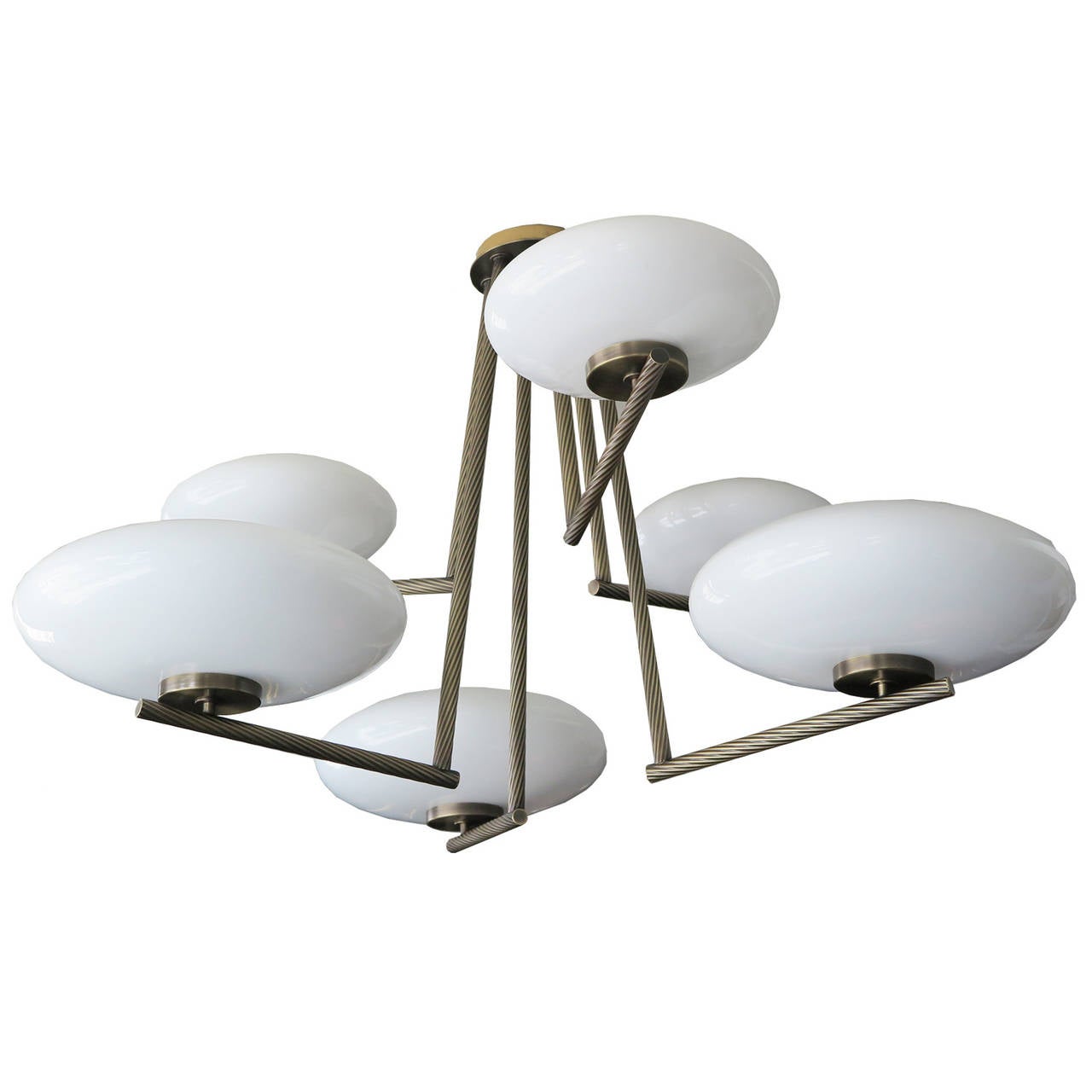Unique six-arm chandelier with milk glass bowl shades. Antique brass frame features turned brass texture, France, 1960s.