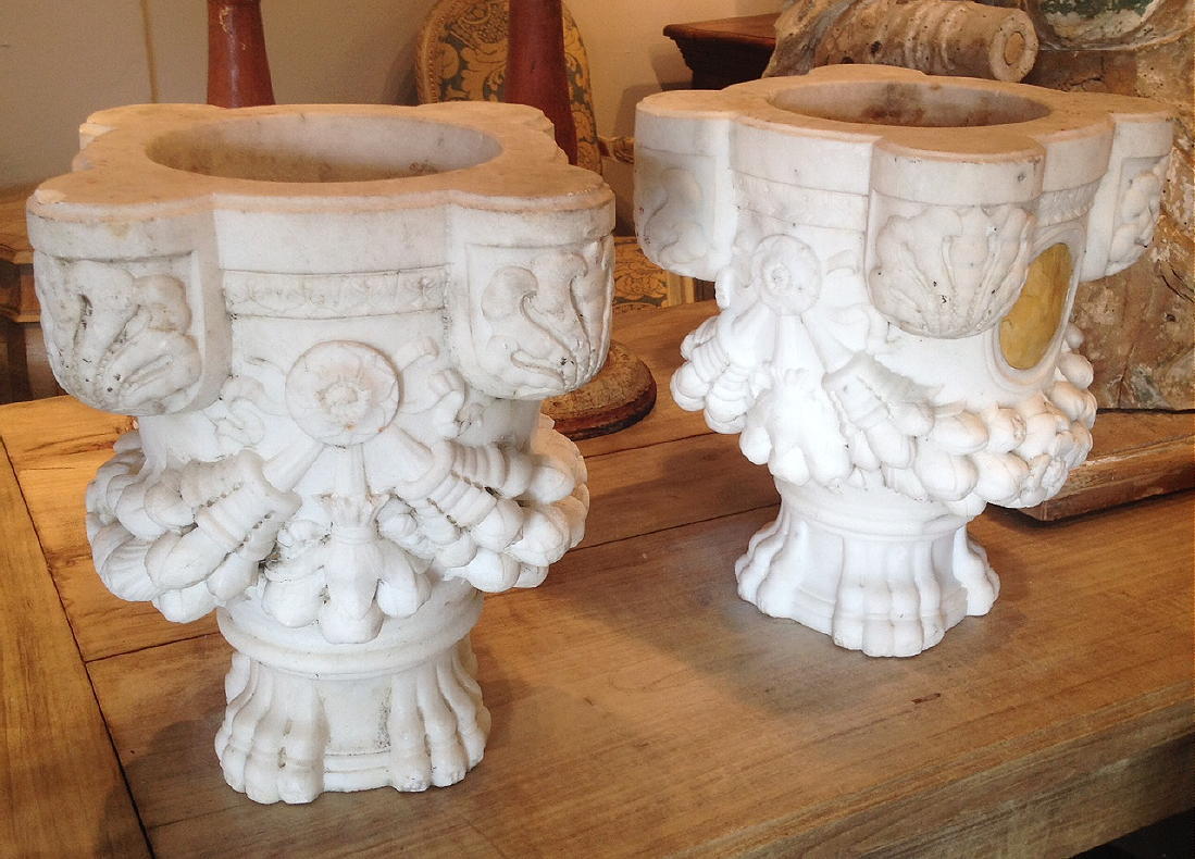 A Pair Of 19th Century Italian Carved Marble Planters With Medallions Of Contrasting Inlay. Carved With Floral Swags Standing On Paw Feet.